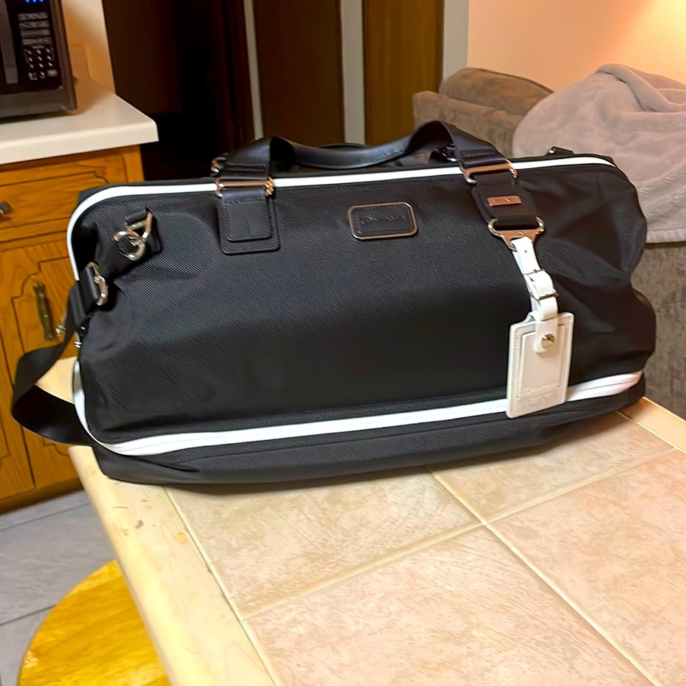 Tumi Lexus limited edition framed duffel bag. Brand new with tags, never used.